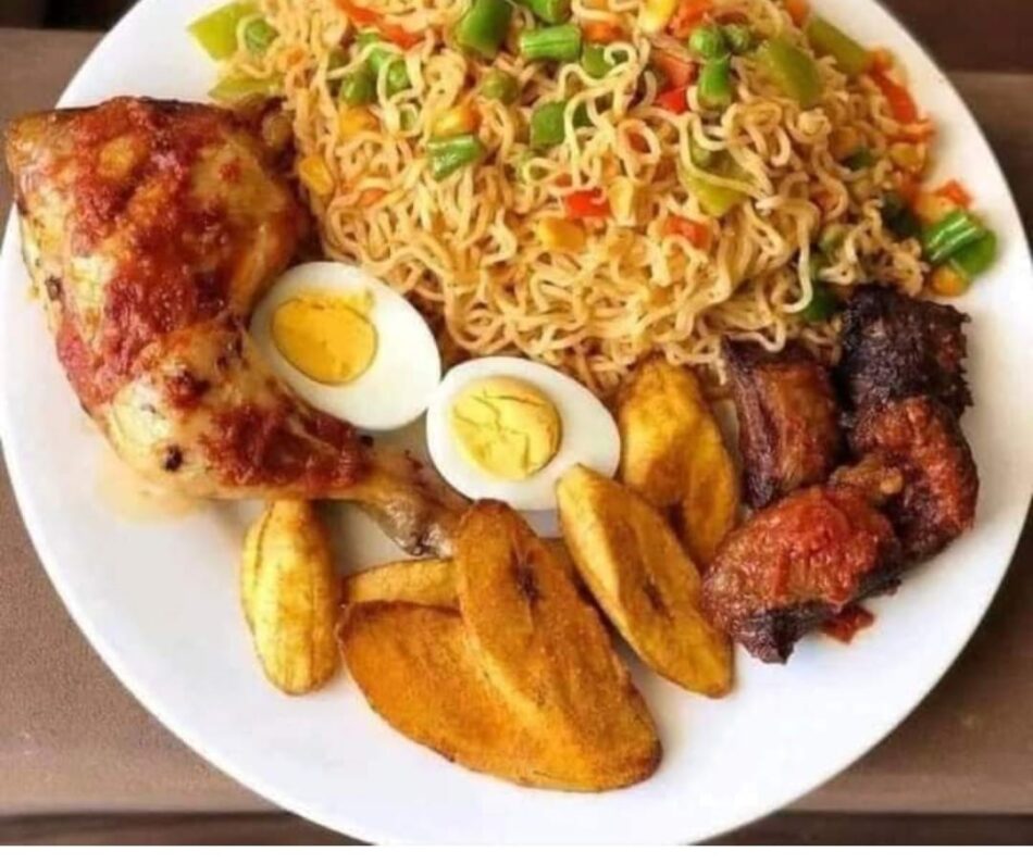 Indomie Noodles with Chicken, Plantain, Boiled Eggs, and Beef
