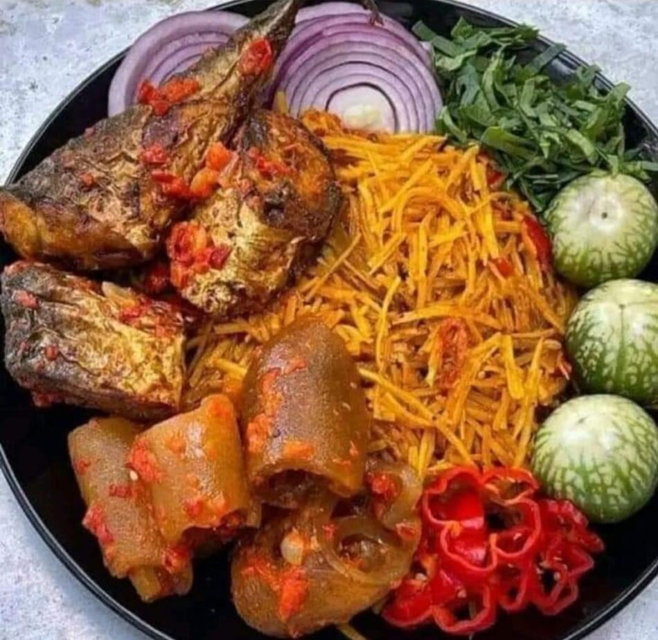 Native Jollof Rice with Smoked Fish, Ponmo, Garden Eggs, and Red Pepper